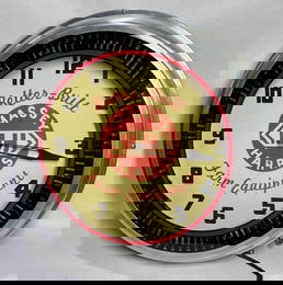 Great Massey Harris neon spinner clock