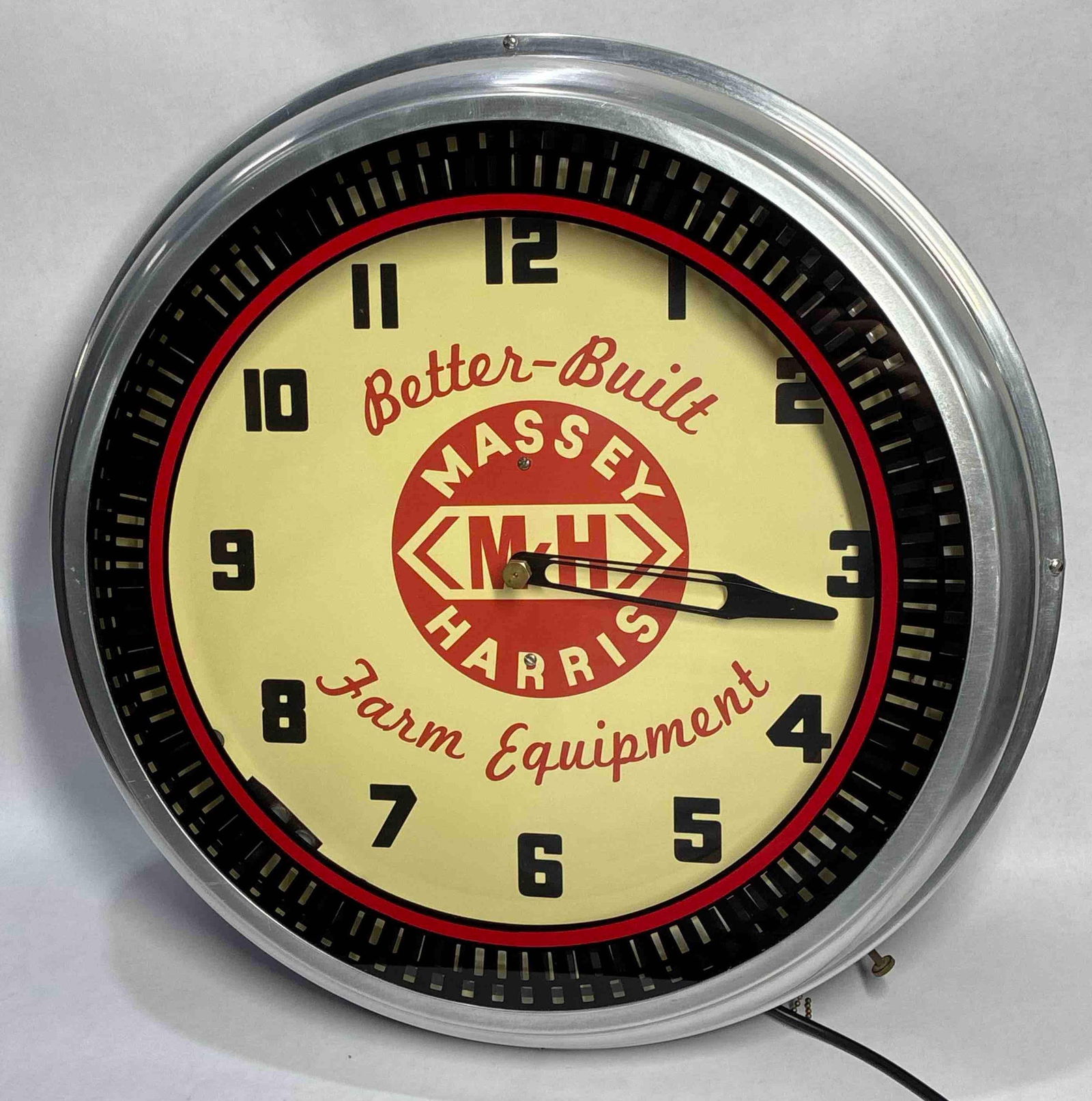 Great Massey Harris neon spinner clock