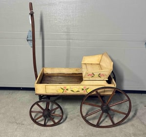 Primitive wooden wheel farm wagon