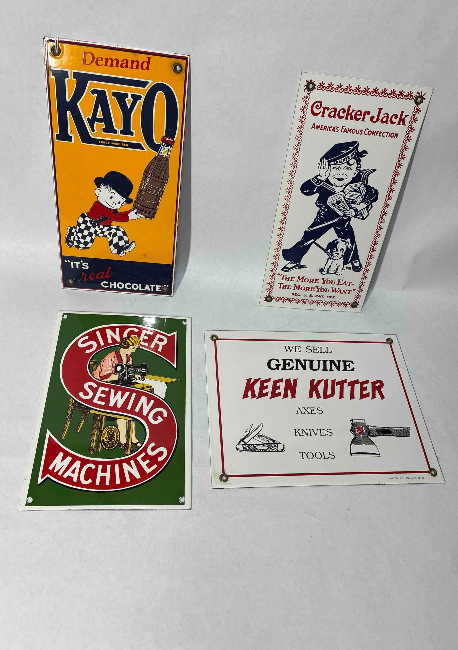 Keen Kutter, Singer, Cracker Jack, and Kayo Porcelain Signs (1 of 10)