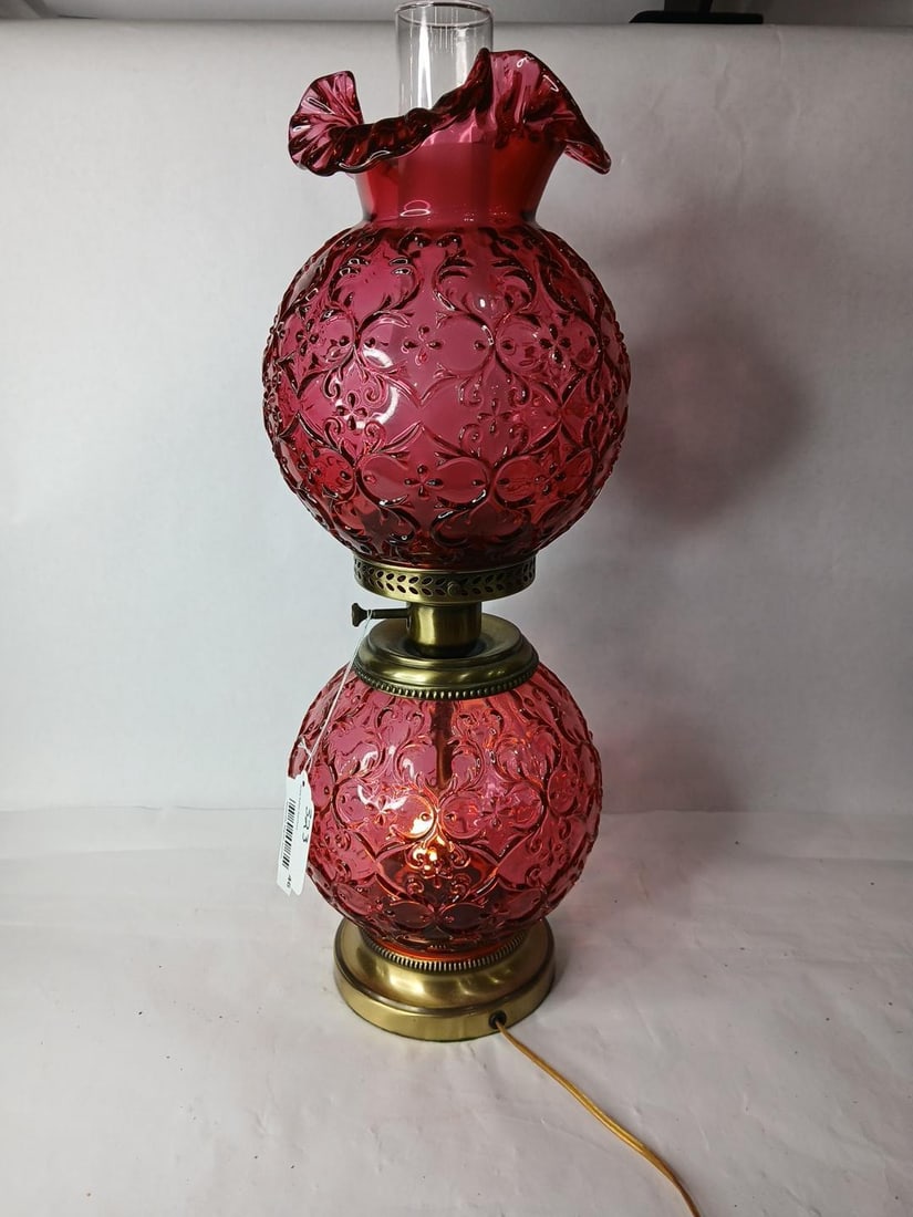 Fenton Cranberry Spanish Lace Gone with the Wind Lamp: Electric lamp with a cranberry glass body and globe. Brass frame. Working great! 23 inches tall
