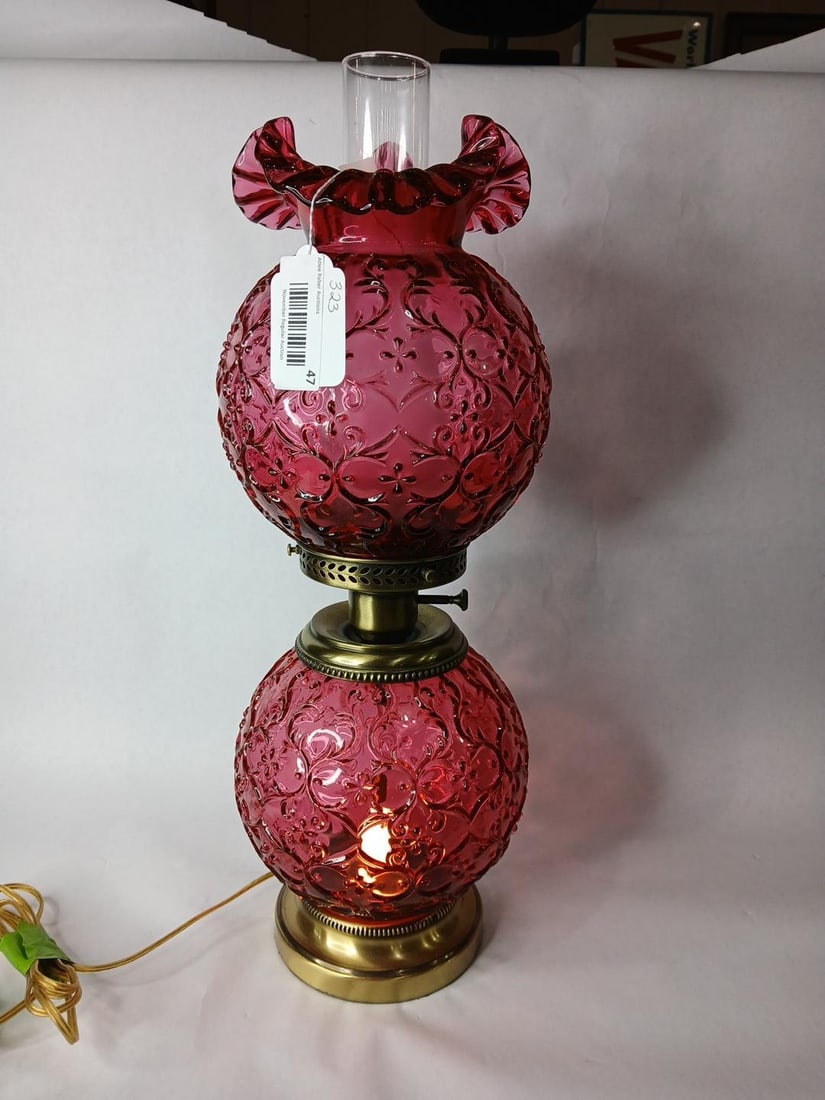 Fenton Cranberry Spanish Lace Gone with the Wind Lamp: Electric lamp with a cranberry glass body and globe. Brass frame. Working great! 23 inches tall