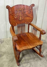 Hand Carved Ornate Armed Wood Rocker