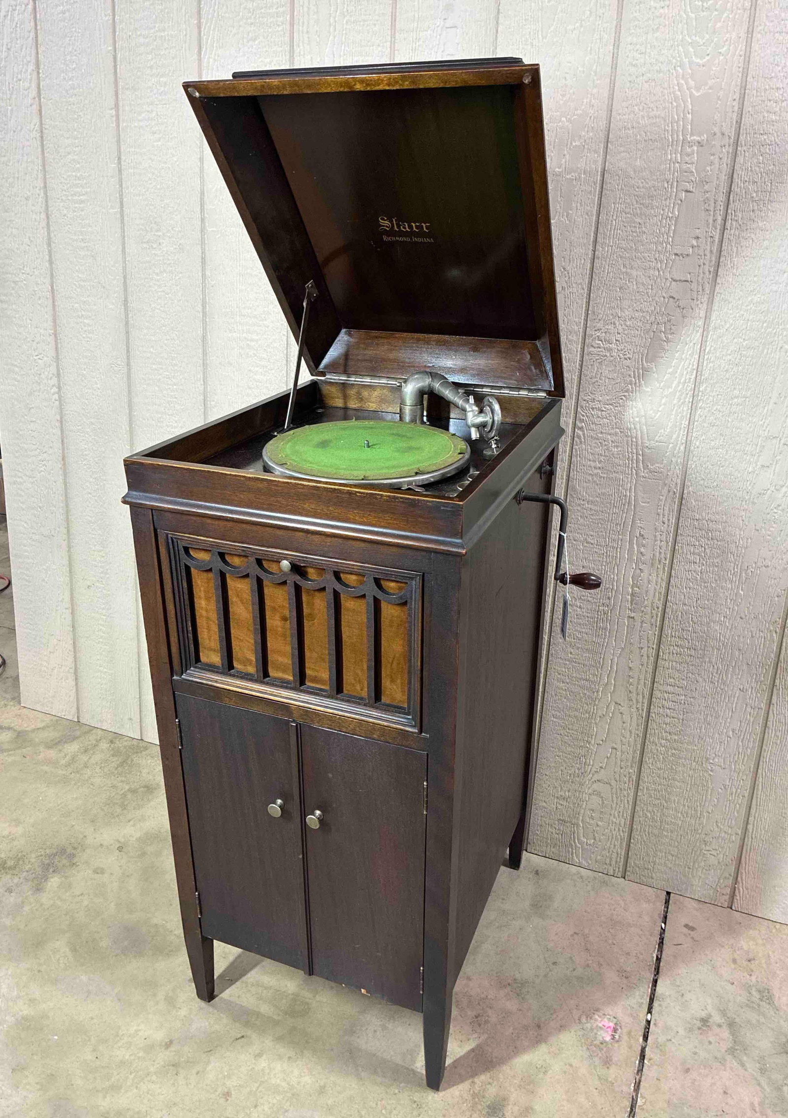Starr Victrola Record Player: Richmond Indiana. Lower storage for records. No model number found. Appears to be working but has not been tested. 42x18x22. Scuffing to top