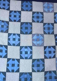 Hand Stitched Amish Made Monkey Wrench Pattern in Blues