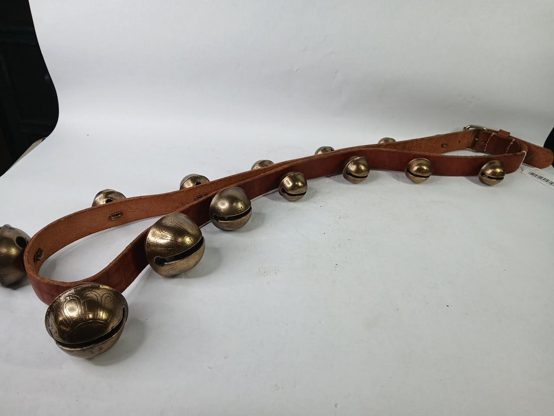 Great Brass Strand of Graduated Sleigh Bells: Soft leather belt with sizes 10 to 0 bells. Strap is approx 70 inches long