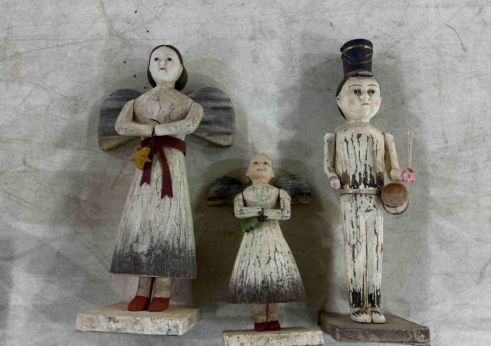 Hand Carved Folk Art Angel and Drummer Boy Figural Statues: showing paint crackling 9 to 14 in. H 