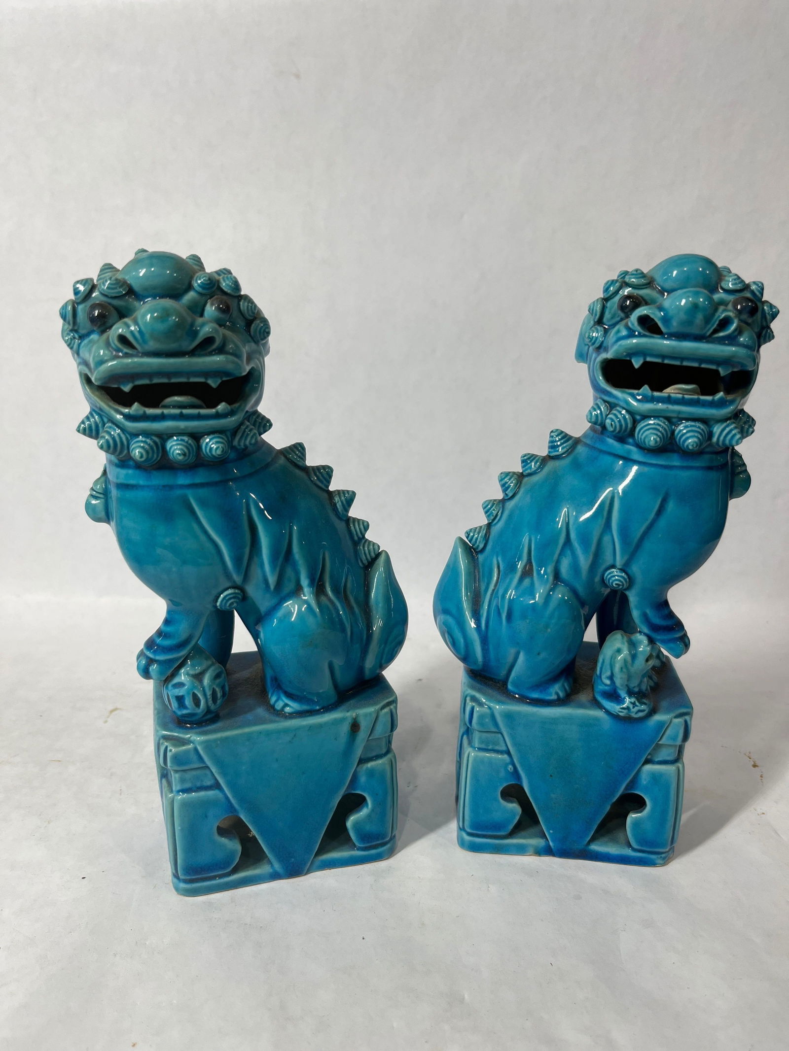 Fo Pottery Dog Statues: Bottoms are stamped China. Each is 7.5 inches tall. No chipping or cracks