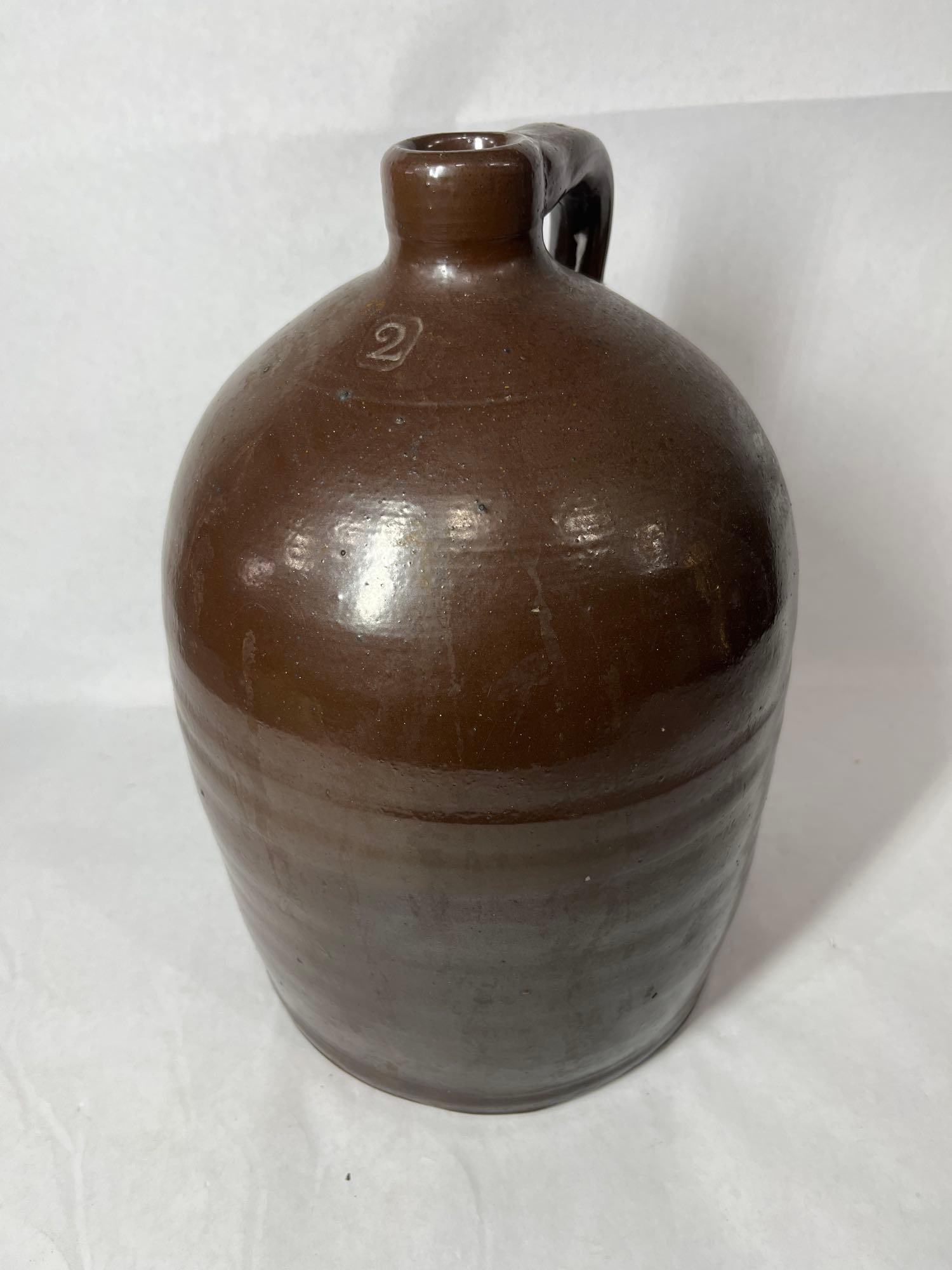 2 Gallon Stamped Stoneware Jug: No cracks chips. Great condition. 13 inches tall