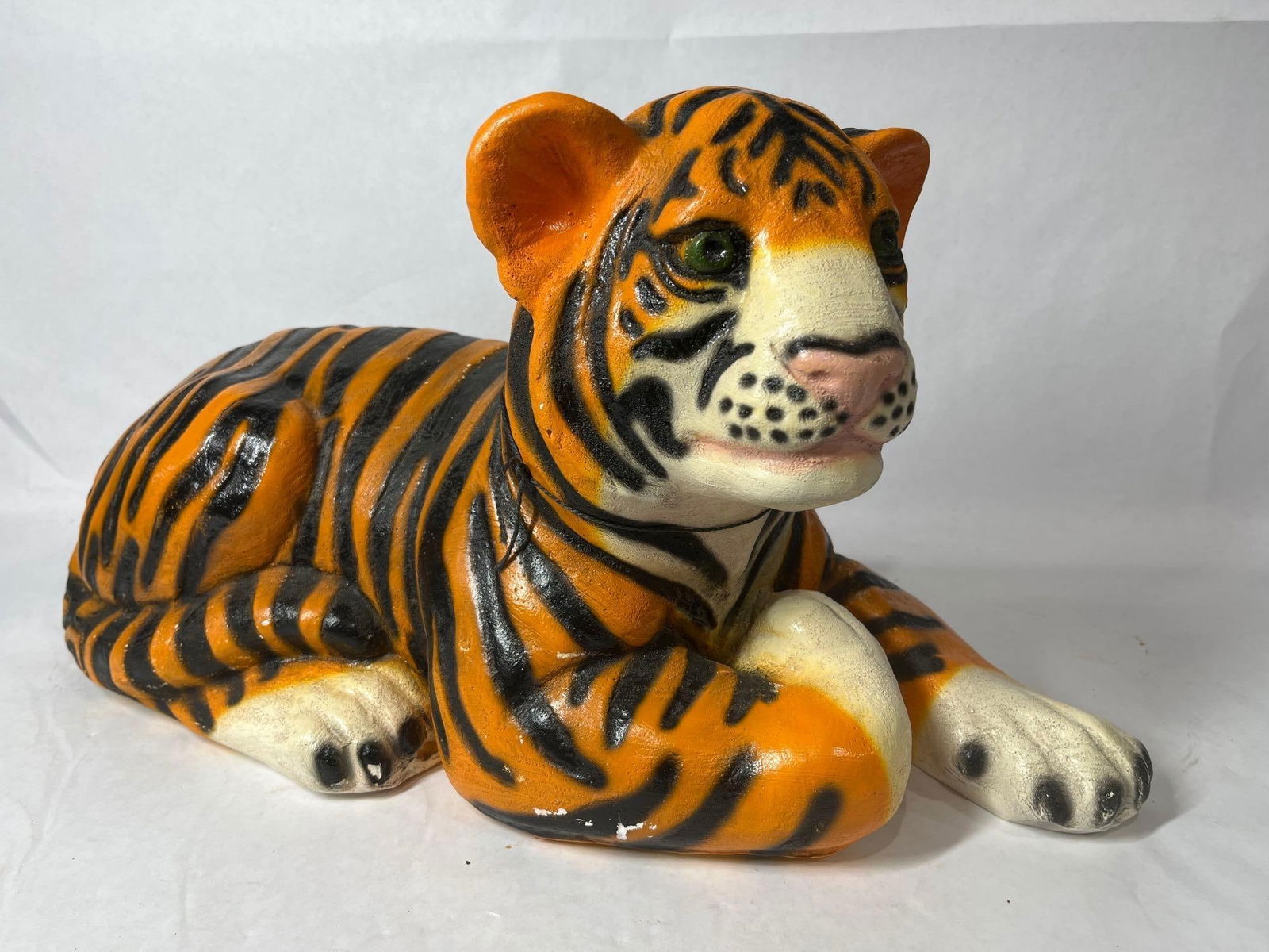 Mid 20th Century Hand Painted Plaster Laying Tiger Coin Bank Sculpture: Showing very minor areas of flaking due to age 10.5 x 19