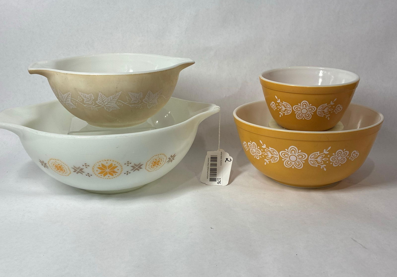 Pyrex Mixing Bowl Lot of 4 Assorted Patterned/Size Bowls: This pyrex lot includes 2 Butterfly Gold bowls as well as a Sandalwood Cinderella showing fading and Town and Country Cinderealla Bowl 