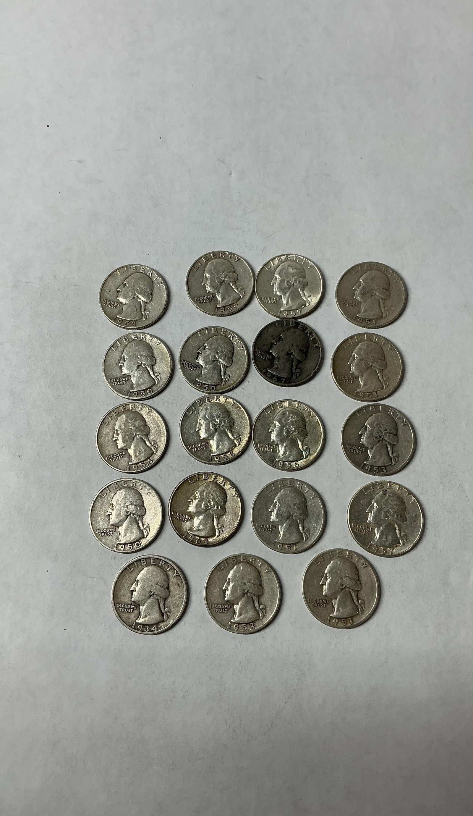 19- Washington Quarters: 1934-1963. One coin is dated 1967. 90% silver coins