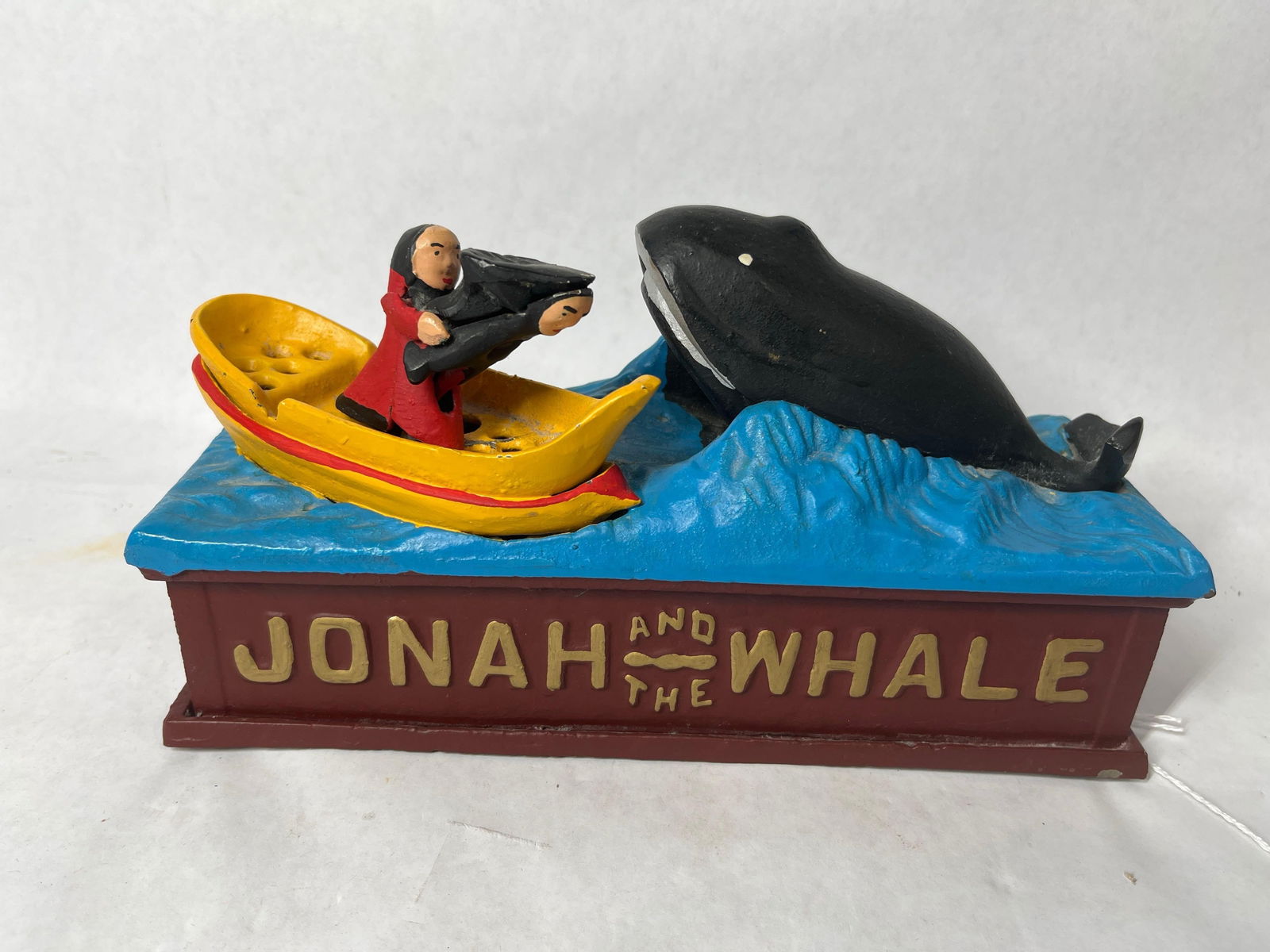 Cast Iron Jonah and the Whale Mechanical Bank: Good working condition. This is a newer piece. 9x3x5