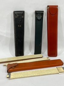 Various Makes and Models of Early Slide Rules in Advertising Cases Inc. U.S. Military One