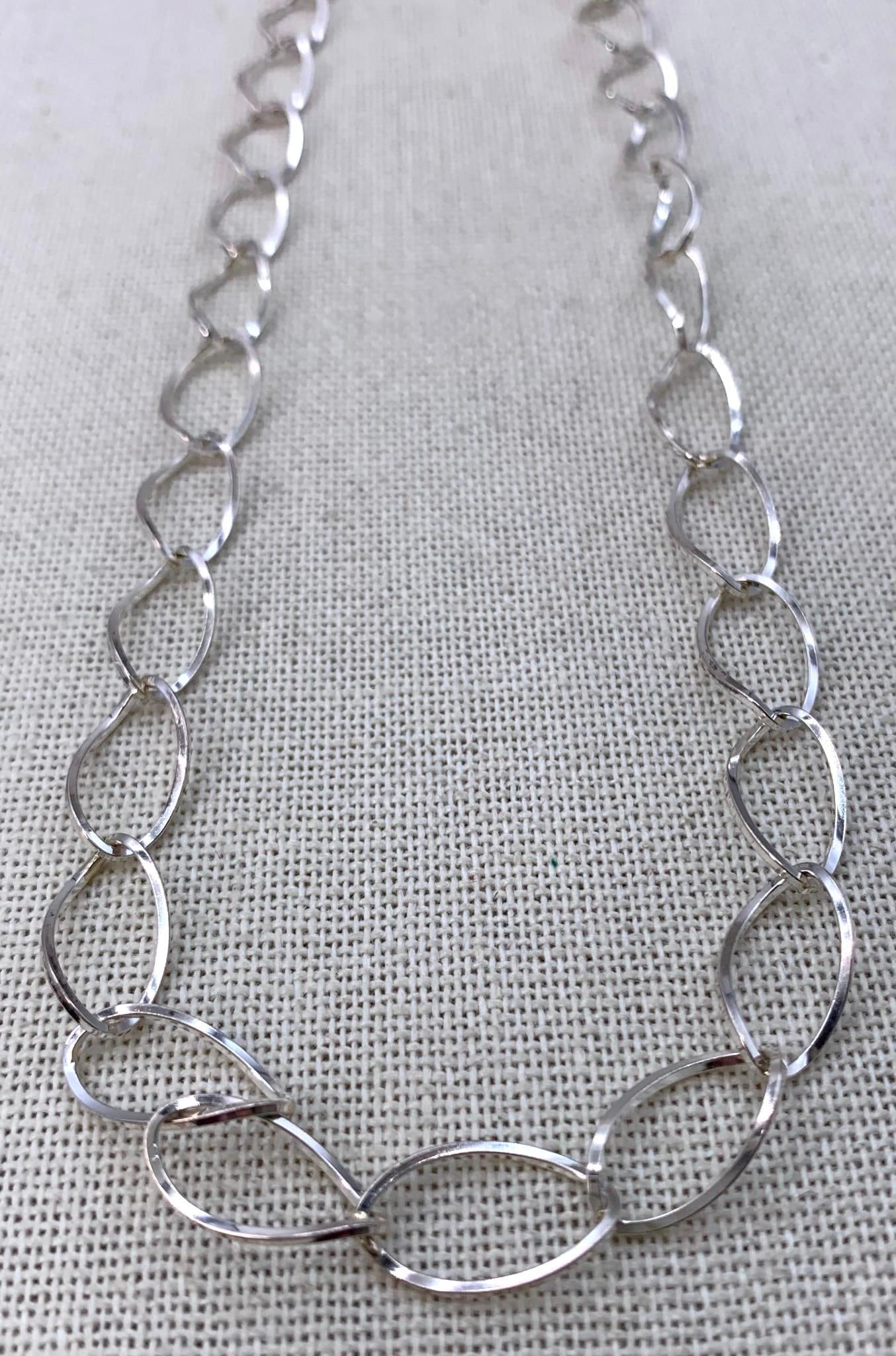 Ethereal Sterling Silver Twisted Oval Openwork Chain Necklace: Stamped Sterling Silver, 10.6 gram weight, 24" circumference, working closure.