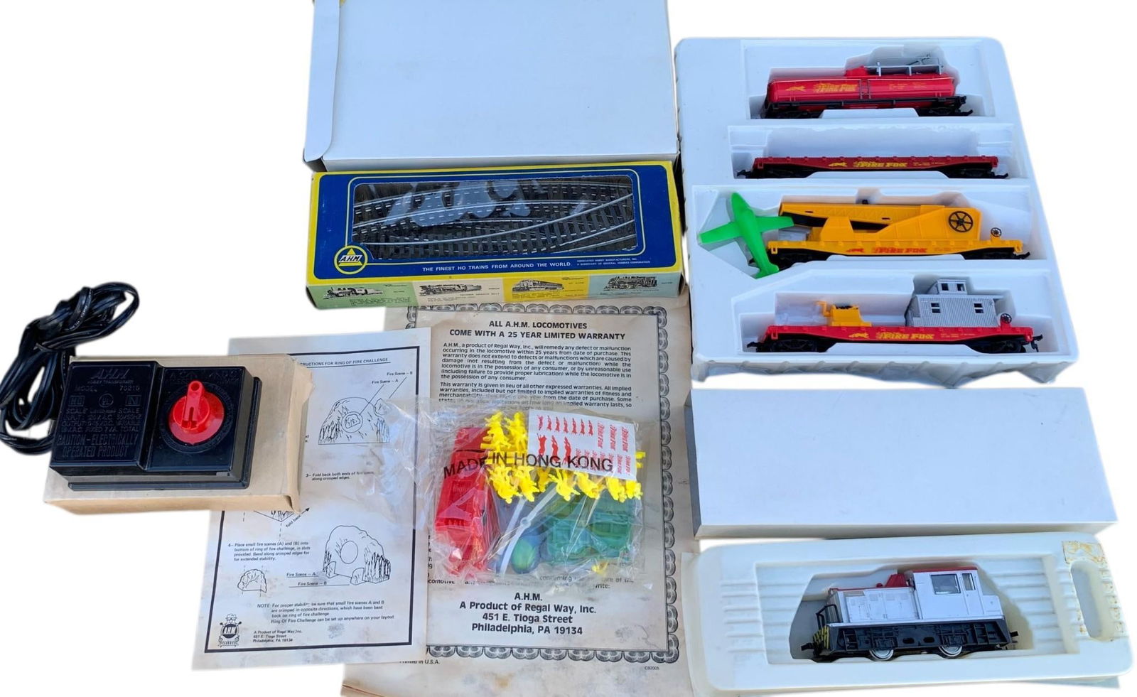 Unused Vintage AHM HO Scale Toy Train Set: All pieces appear unused, there is a instruction sheet for a "ring of fire" but no obvious parts for that application were located in the box. 