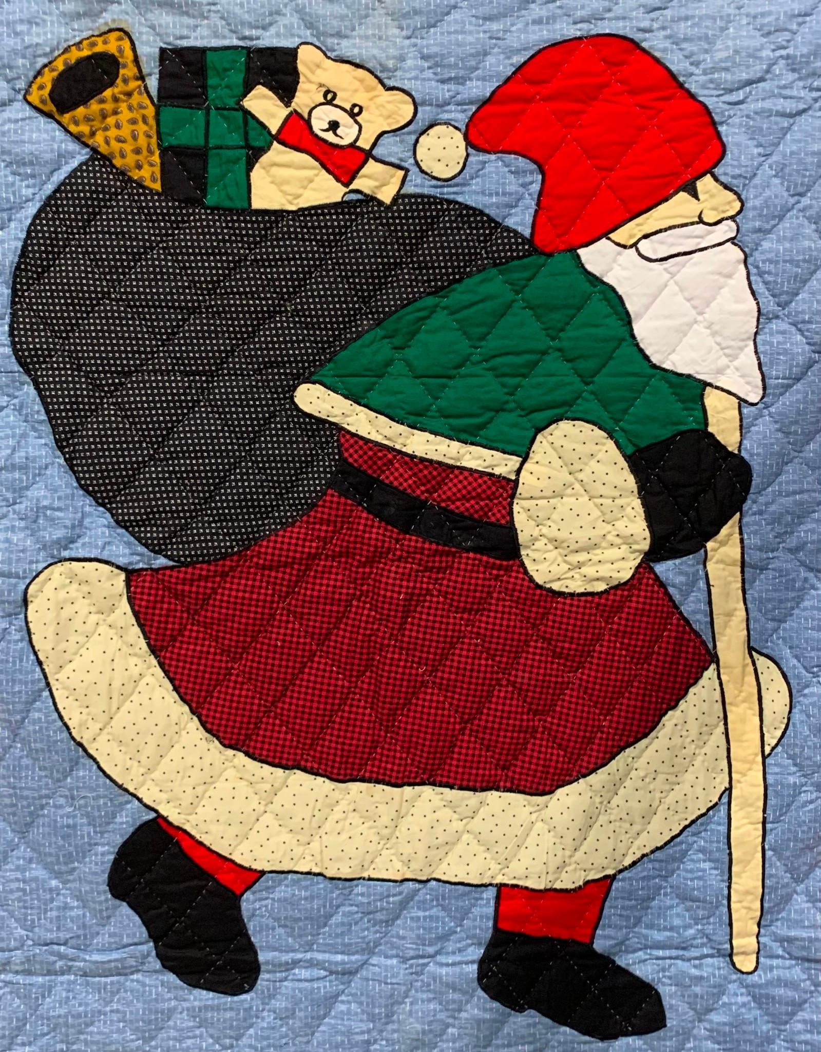 60 x 47 Quilted Santa Claus Christmas Wall Hanging: 60" x 47", even colors, rod hanging loops in the rear.
