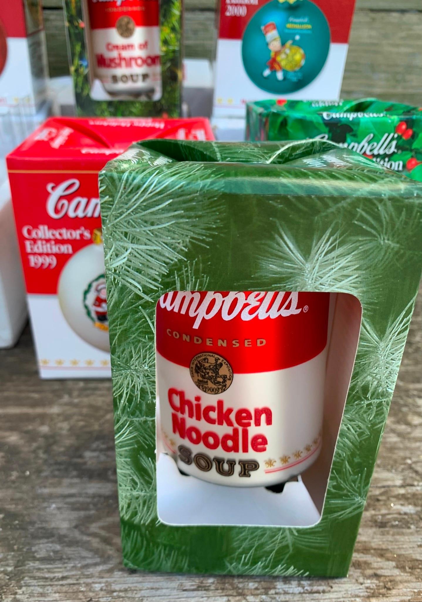 40 Vintage Campbell's Soup, International Santa Claus Collection, Christmas Ornaments: All pieces boxed as shown, the Campbell's Soup ornaments are glass, scattered shelf wear to some of the packaging.
