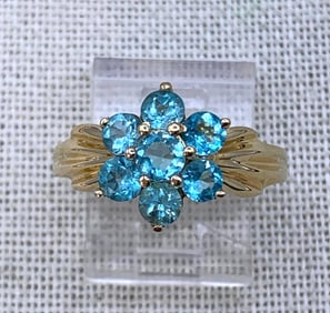 10k Yellow Gold Icy Blue Topaz Flower Ring