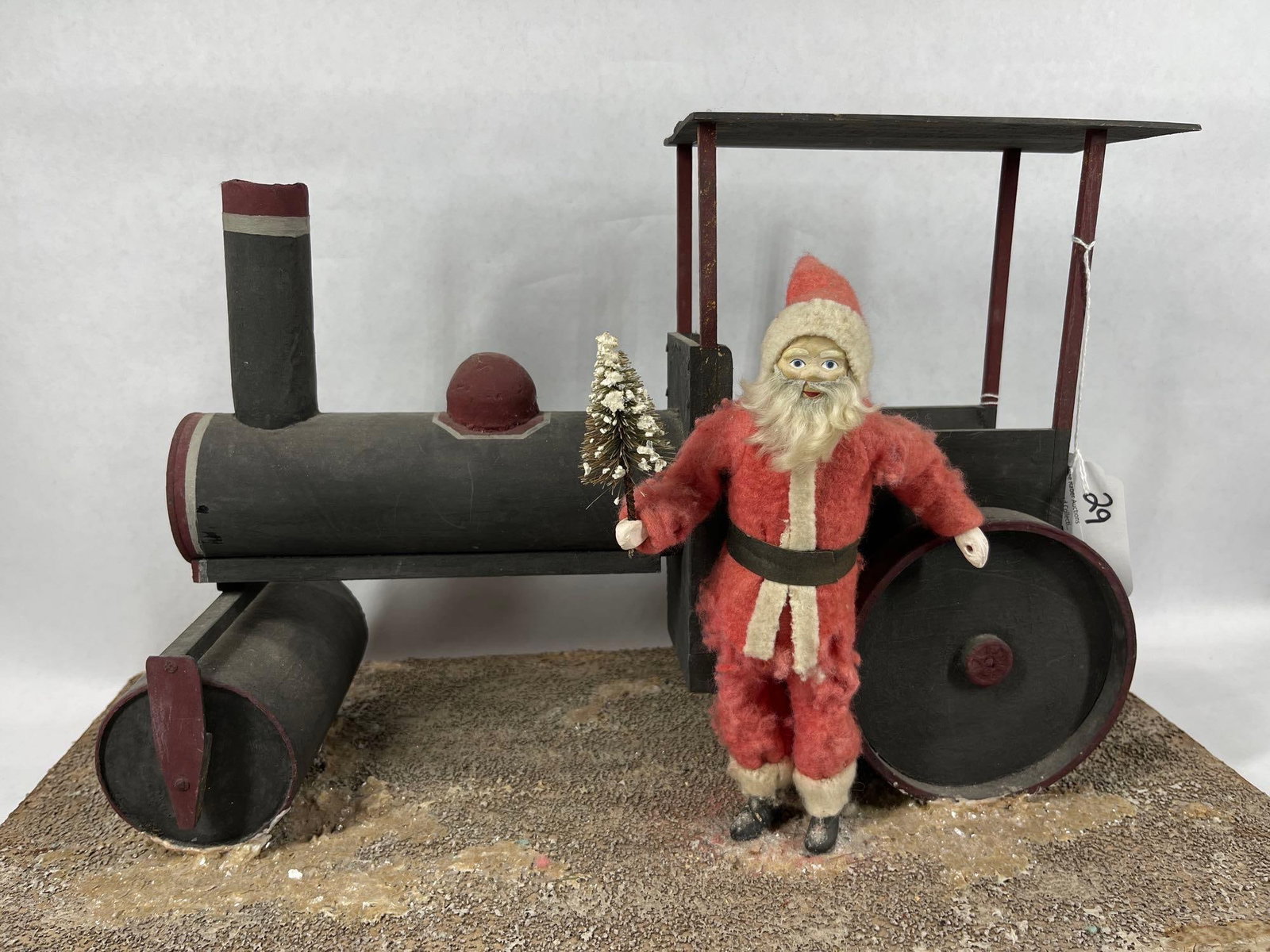 Early Santa and Train Store Display: Made by Merchants Display and Novelty Corp. PM Rudd Distributor, Ca 1940s. Steam roller fabricated pasteboard and wood. 11.5x22x12.5