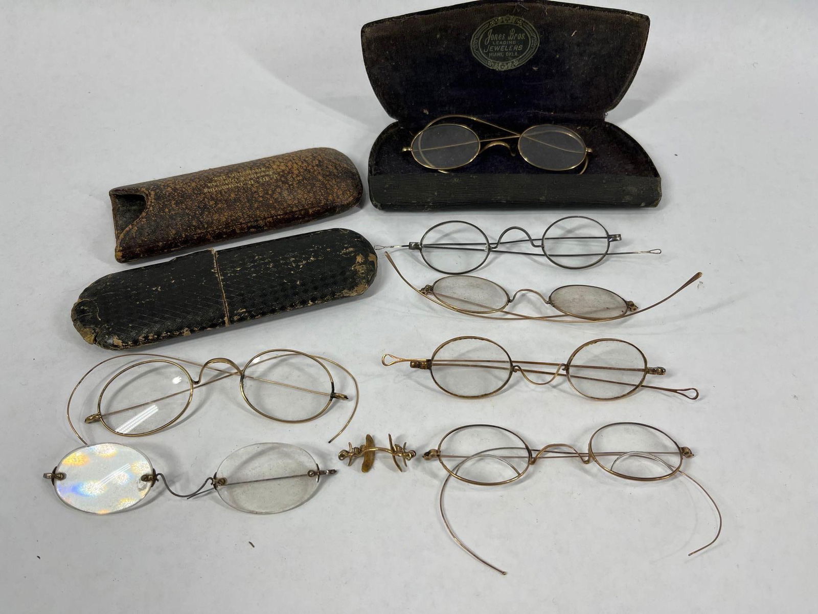 Wire Rim Eyeglasses: 7 pair, including a few cases. These are normally gold or gold filled but these glasses are not marked. They might be!!