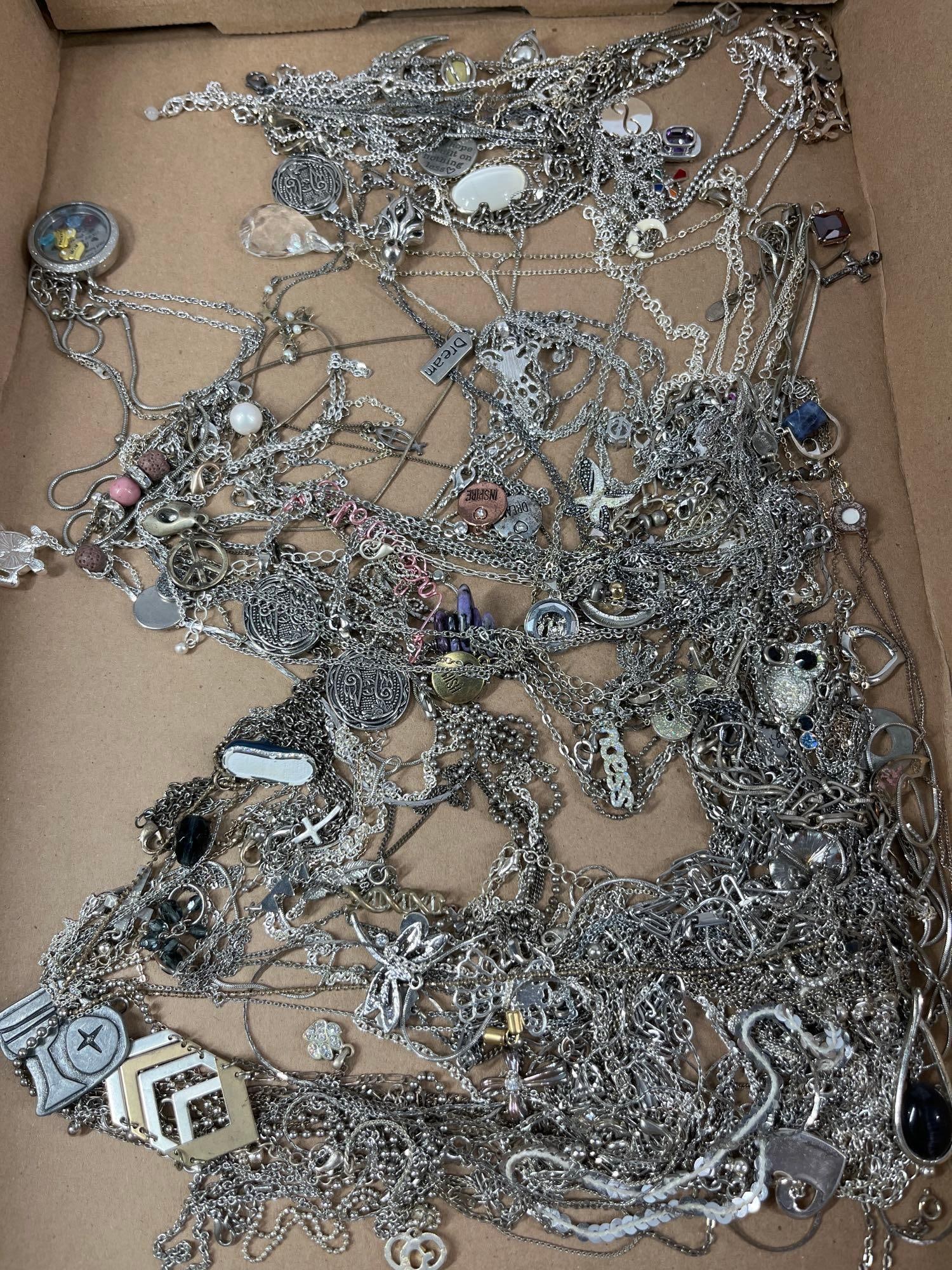 Chain Necklaces and Pendants: Not thoroughly checked but one sterling item was spotted without looking.