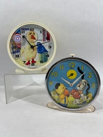 Pair of WIggle Head Key WInd Alarm Clocks