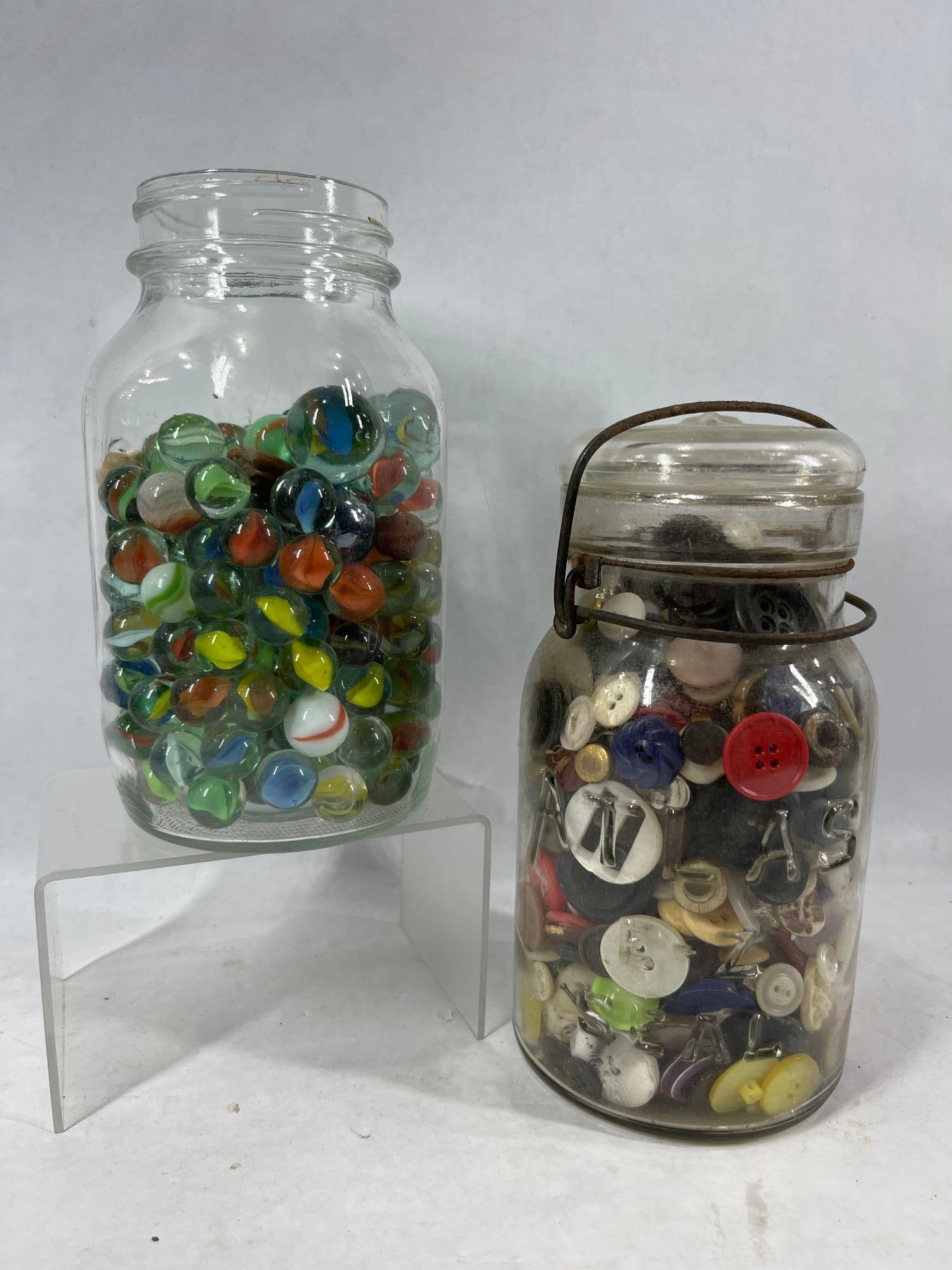 Quart Jars Full of Marbles & Buttons: Lots of metal and glass buttons. Marbles include large shooters, tiger eye and swirl designs