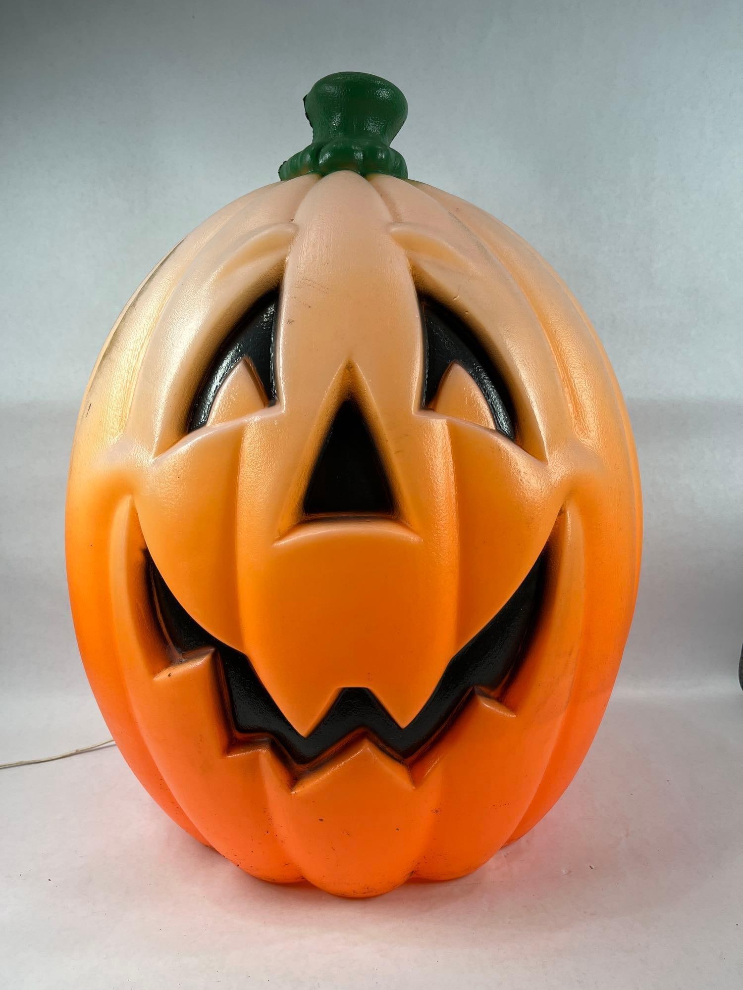 Blow Mold Jack O'Lantern: Lighted, some minor fading to top. 24 inches tall