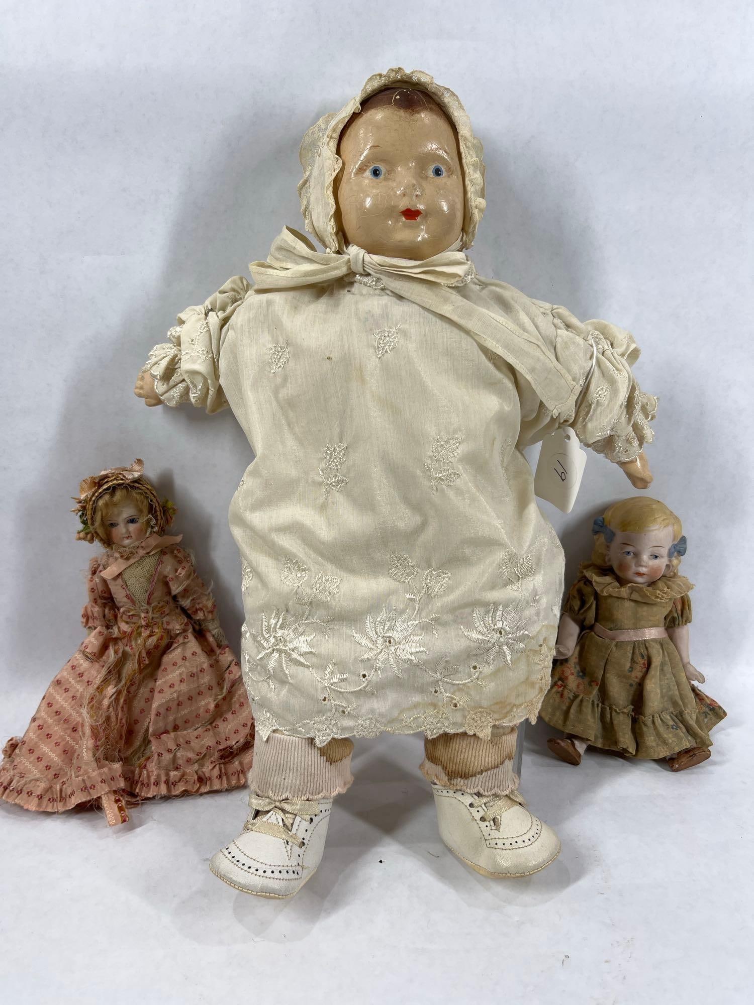 1930s Compo Doll & 2 Bisque Head Dolls: 15 in baby doll with stitched clothing and bonnett. Other two dolls are approx 7 inches