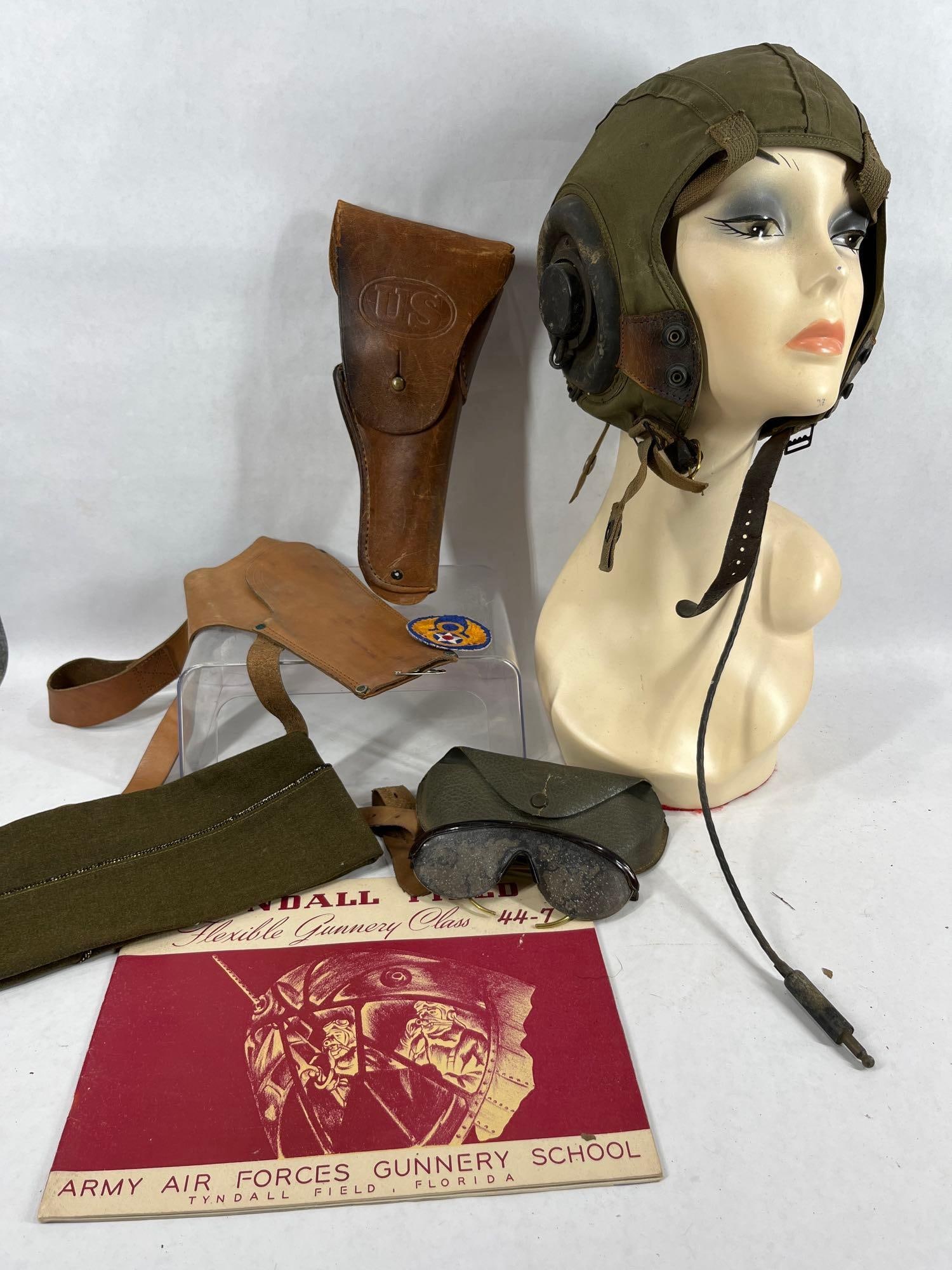 WW2 Aviation and US Military Items: American Polaroid aviator sunglasses, in poor condition but still super cool! Leather pistol holsters one marked US, and many other awesome items. Army Air Forces Gunnery School yearbook