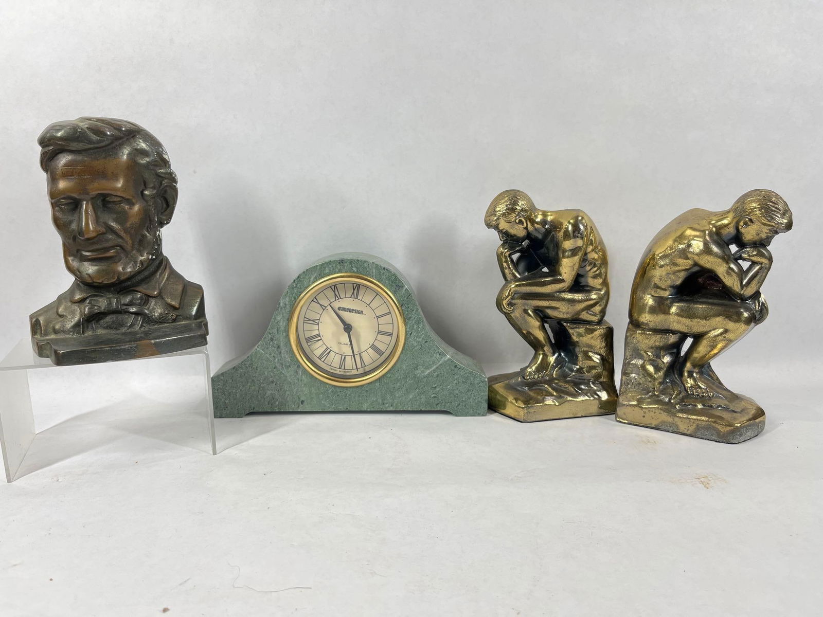 Abe Lincoln and Thinker Bookends and Mantle Clock: Clock is 9 inches battery op. Lincoln bookend is cast iron.
