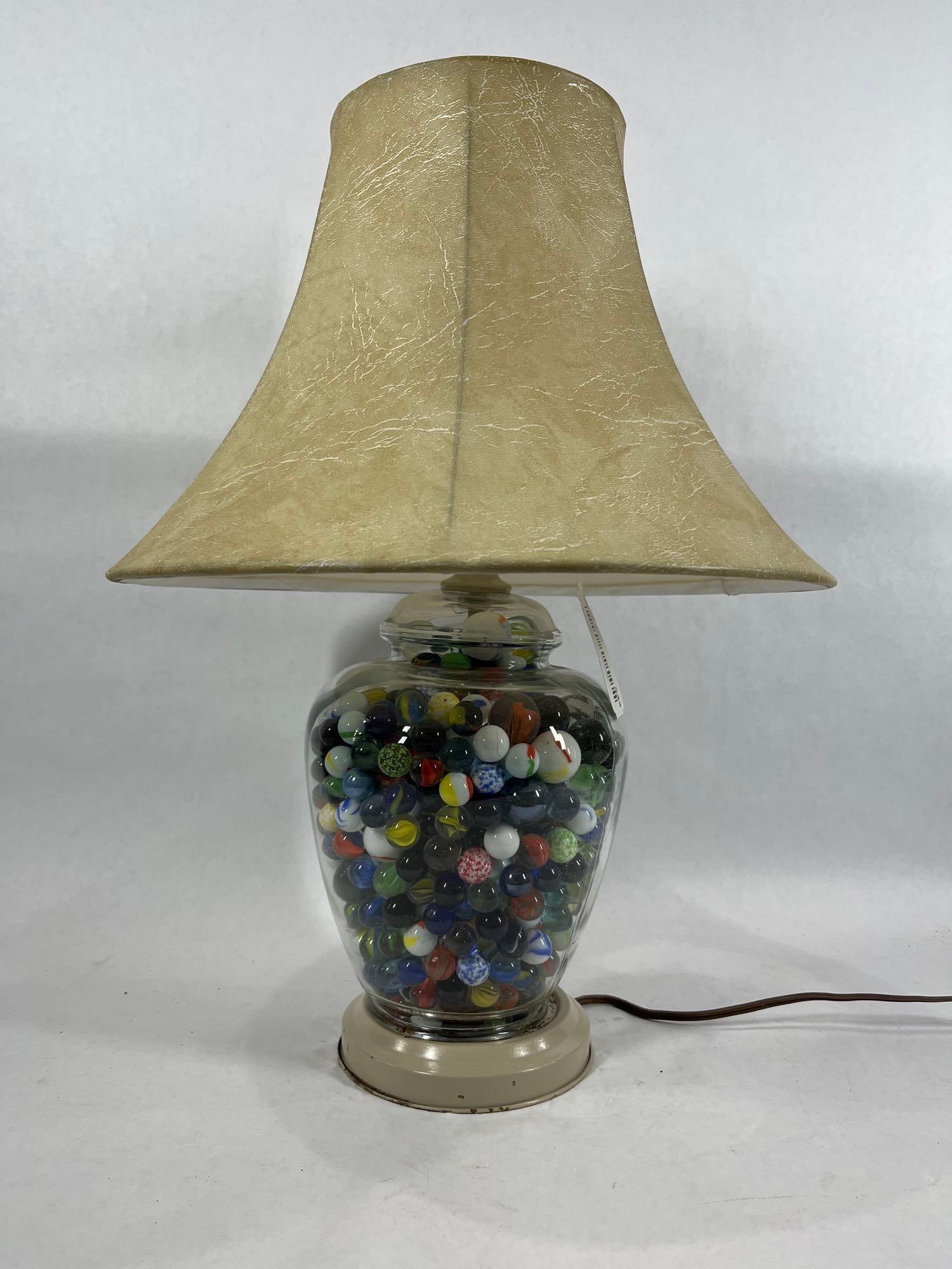 Glass Marble Filled Table lamp: Glass marbles and shooters. 18 inches tall.