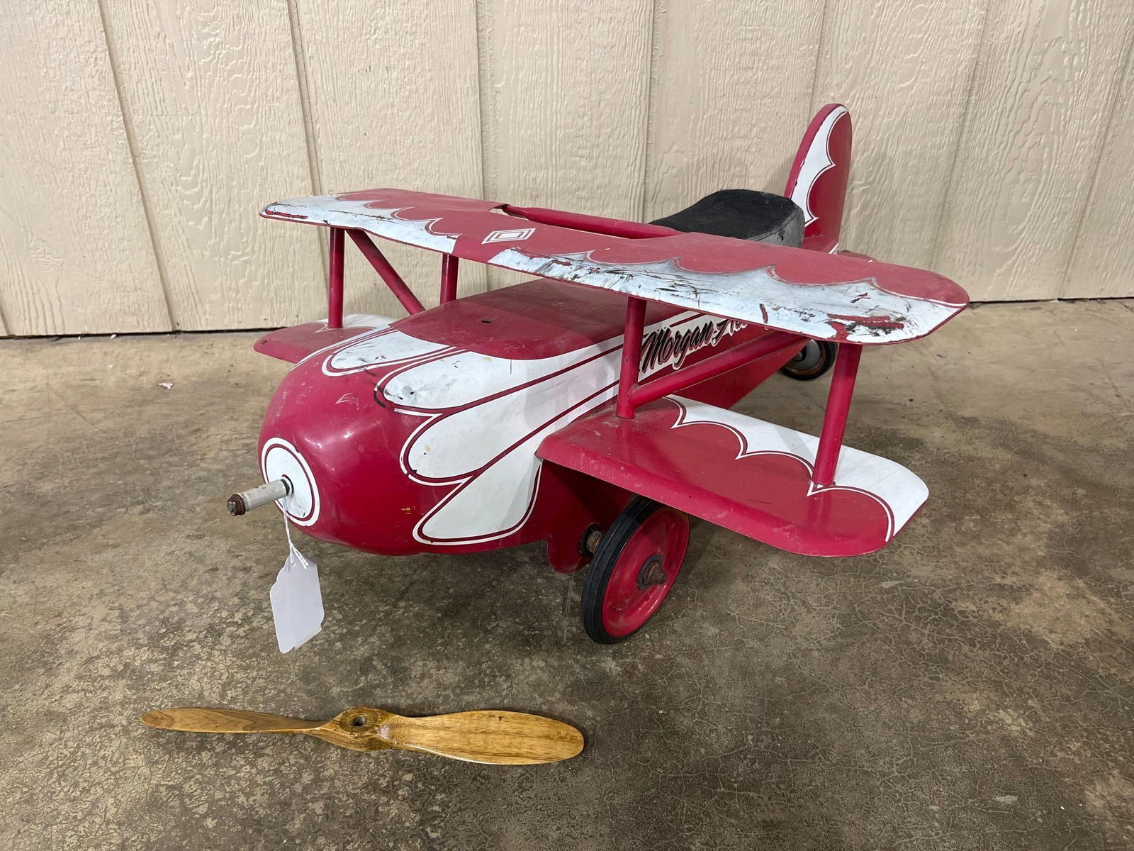 Morgan Ace Flyer Ride On Plane: Metal body with cushioned seat and wooden propeller. 31x24