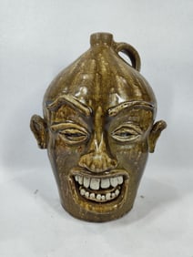 Signed Stoneware Face jug