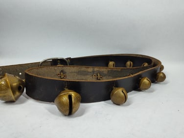 Double graduated strand of brass sleigh bells
