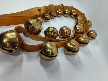 Strand of double graduated brass sleigh bells