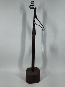 Hand forged wrought-iron Rushlight on wood