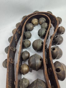 Strand of double graduated brass sleigh bells
