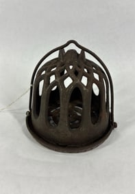 Early cast iron string holder