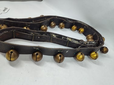 Strand of double throated brass sleigh bells