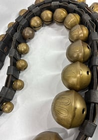 Strand of double graduated brass sleigh bells