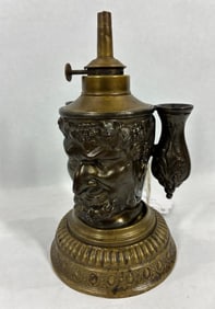 Rare early brass/bronze figural cigar lighter