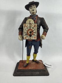 Contemporary cast figural clock peddler