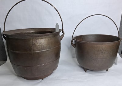 2- Cast-iron footed pots