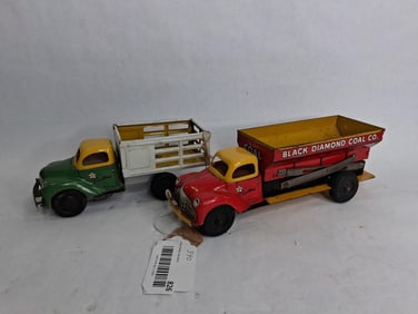 2- 1950s Walt Reach by Courtland windup trucks