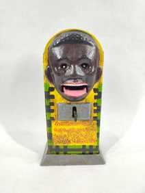 Black Americana cast iron mechanical bank