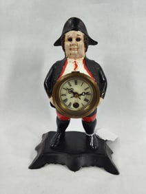 Reproduction cast iron Toby blinking eye figural clock