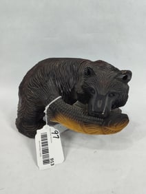 Black Forest style carved bear with fish