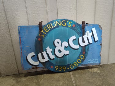 Sterling's Cut & Curl wooden sign